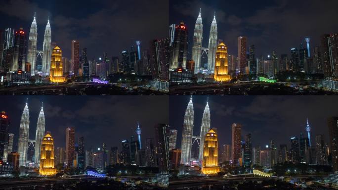 夜间照明飞行在交通道路吉隆坡市著名的市中心航拍全景4k延时马来西亚