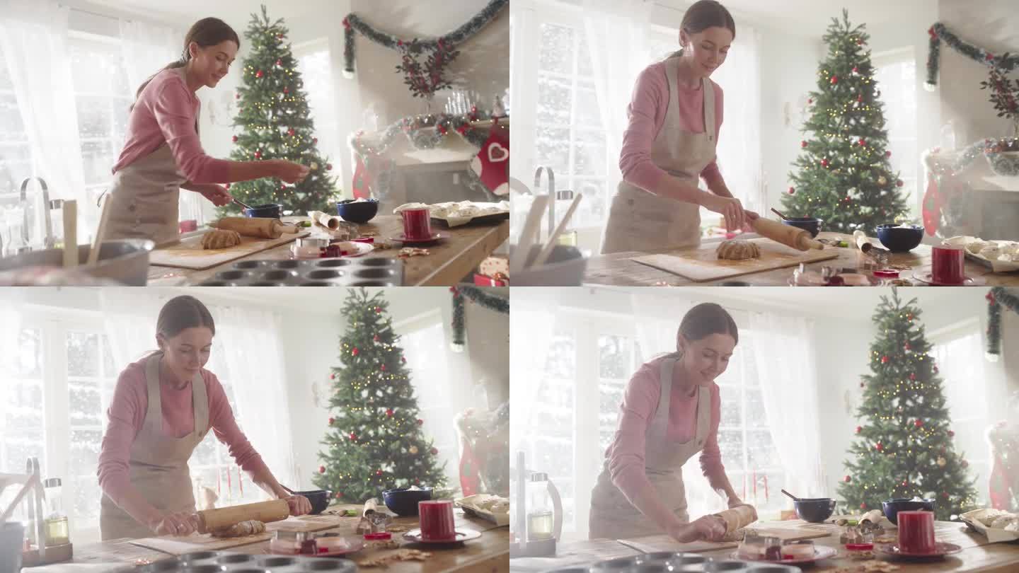 动态荷兰视角:美丽女人准备面团制作姜饼的电影慢动作。慈爱的母亲在圣诞节为她的家人准备糕点
