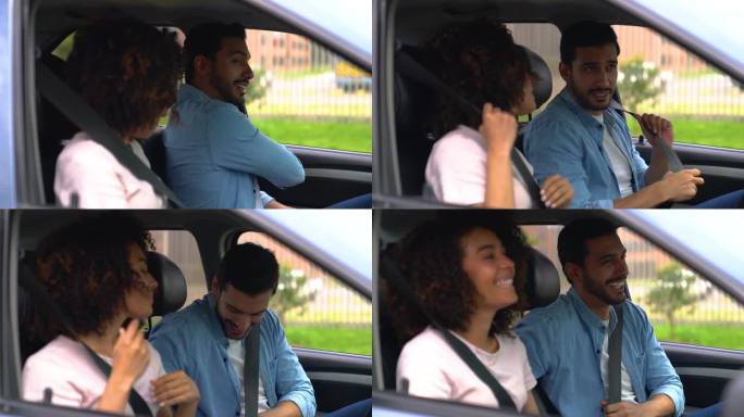 一对年轻的拉丁美洲夫妇在一辆车里系紧安全带，计划着要去哪里