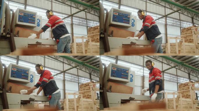 熟练的木工在当代家具制造厂的中心操作机械。