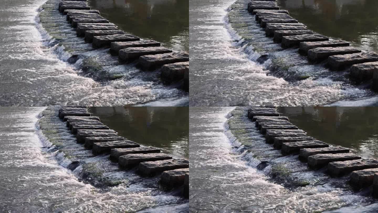 河上的石砌桥碇步石阶水流