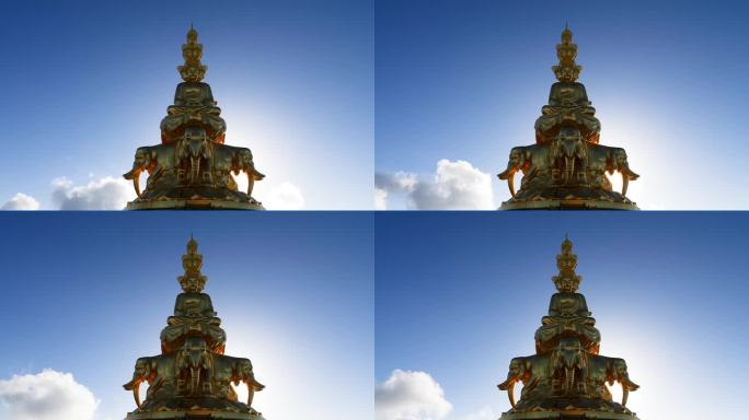 在晴朗的日子里，白云与金色的浦仙佛像前景和蓝天背景一起移动的4k延时镜头。