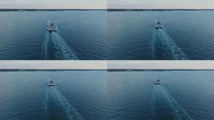 从上到下的无人机拍摄的渡轮离开避难所岛前往格林港北福克长岛纽约日出前