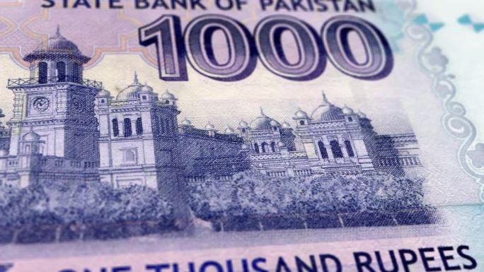 巴基斯坦巴基斯坦卢比1000钞票，一千巴基斯坦卢比，巴基斯坦卢比的特写和宏观视图，跟踪和多莉拍摄10