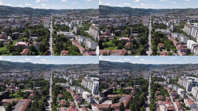 巴尼亚卢卡天际线:郁郁葱葱的城市航拍全景在宏伟的大道。波斯尼亚