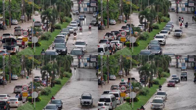 在被水淹没的道路上行驶的车辆。