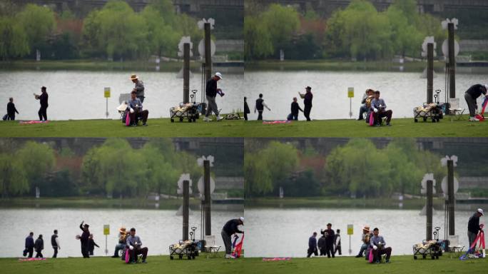 湖边放风筝的人们