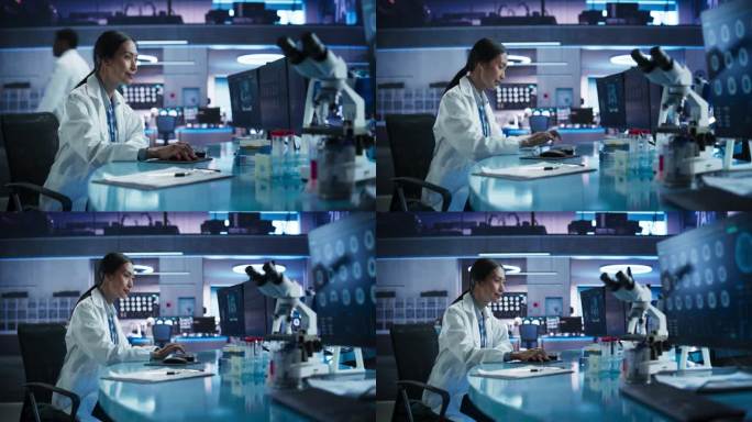 医院研究中心实验室:亚洲女性神经科医生使用台式电脑对人脑进行核磁共振扫描。专业科学家发现精神障碍的创
