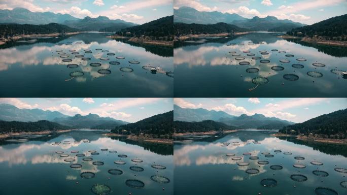 鸟瞰美丽的湖在山上和养鱼场