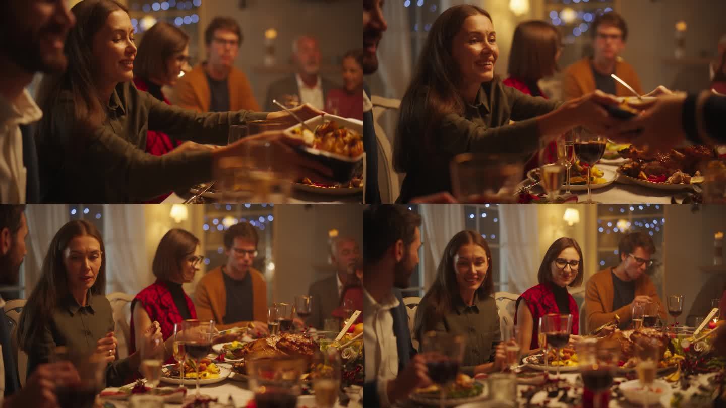 一个女人和家人在一张大桌子旁吃饭的肖像。亲人谈笑风生，享受美食。亲密的晚餐设置与不同的客人庆祝圣诞节