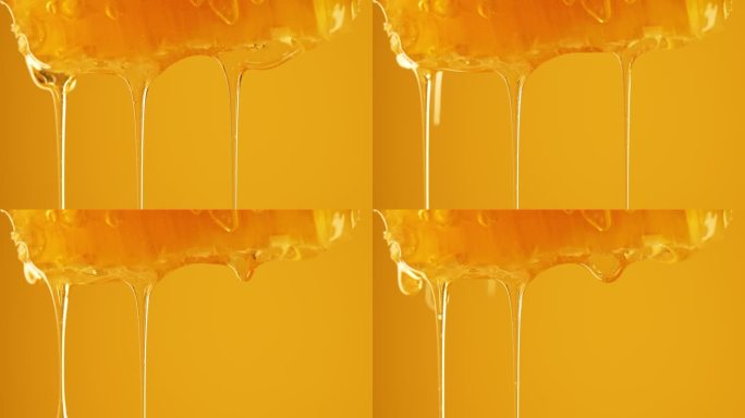 黄金长生不老药:蜂蜜滴下的迷人微距镜头，大自然的液体黄金。