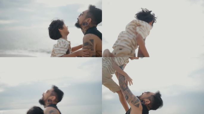 小儿子在沙滩上向父亲跑去。父亲抱着他的小儿子在沙滩上围成一圈。
