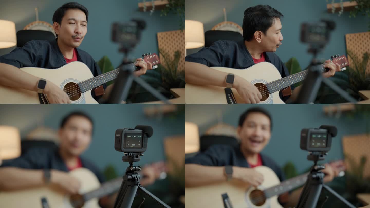 英俊的亚洲男子博主录制视频课教程，在家庭工作室的现代智能手机上弹吉他。