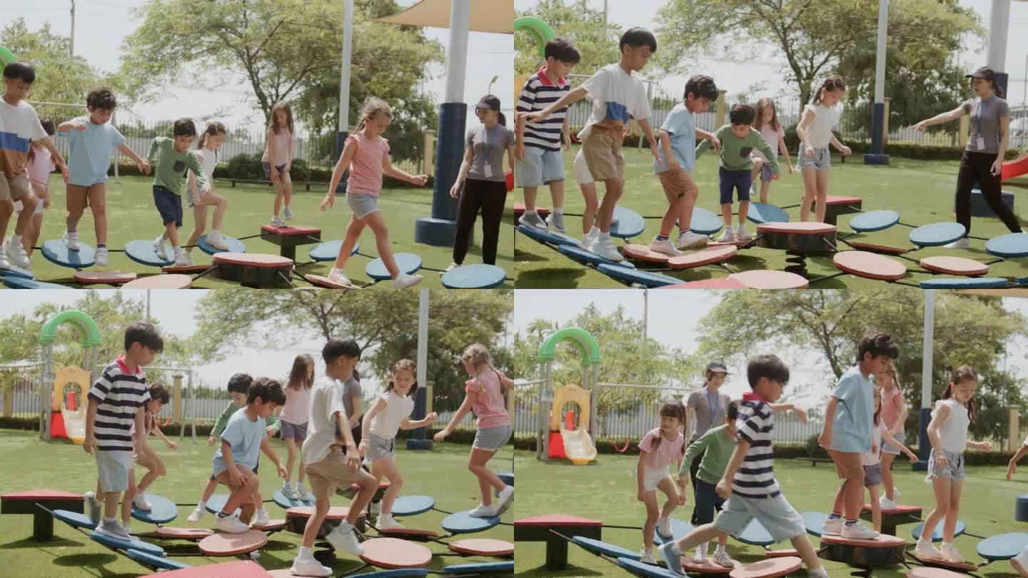 一个阳光明媚的夏日，在一所小学的绿色公园里，一位快乐的老师正在和来自不同国家的幼儿园小朋友练习平衡。