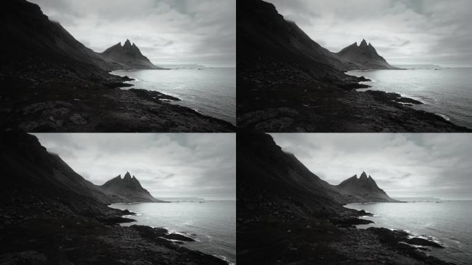 航空vesturhorn山，黑沙滩鹳鸟，飞越火山黑色喜怒无常的岩石，喜怒无常的风景，冰岛