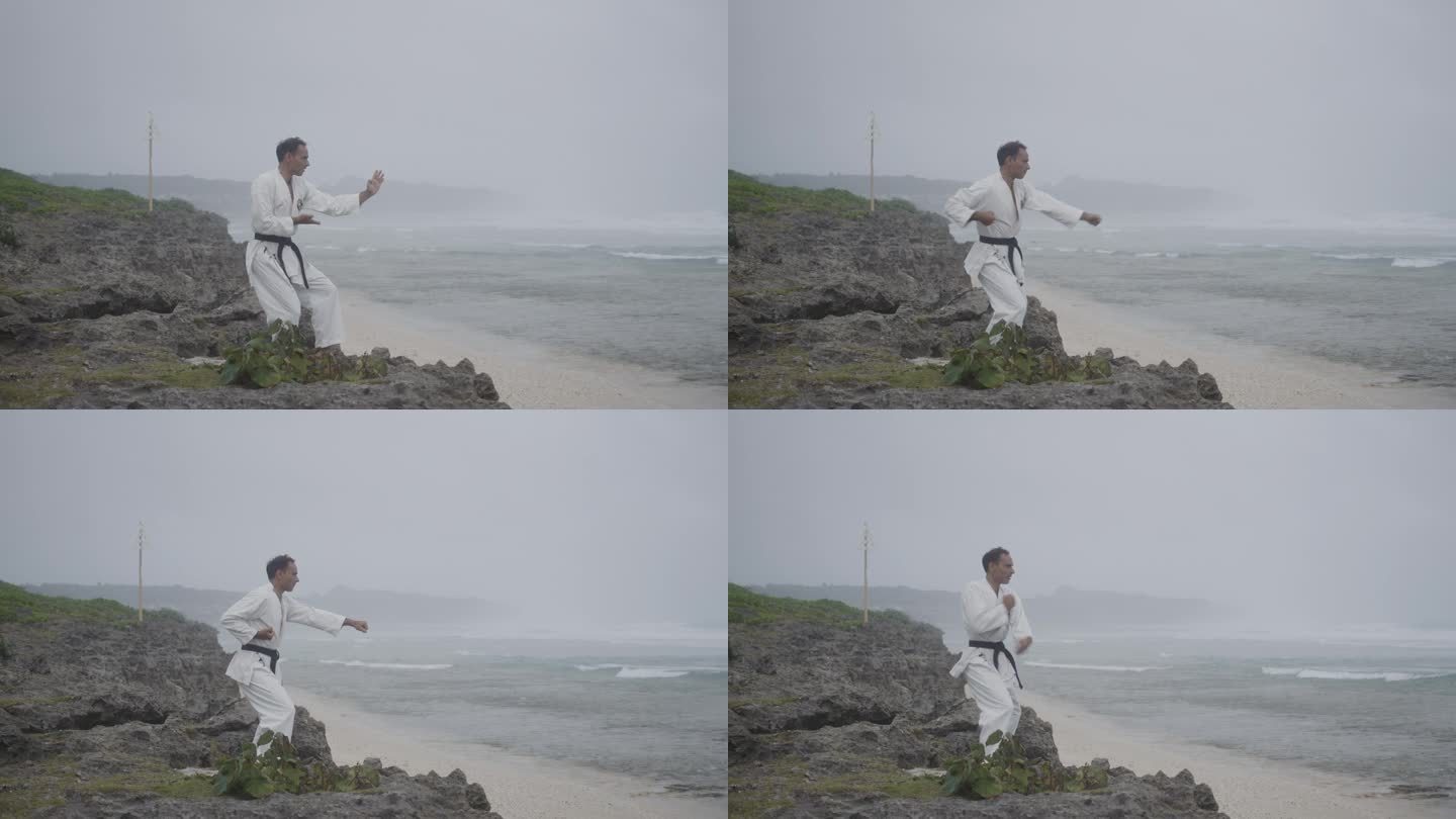 一个中年男子在海滩上练习空手道