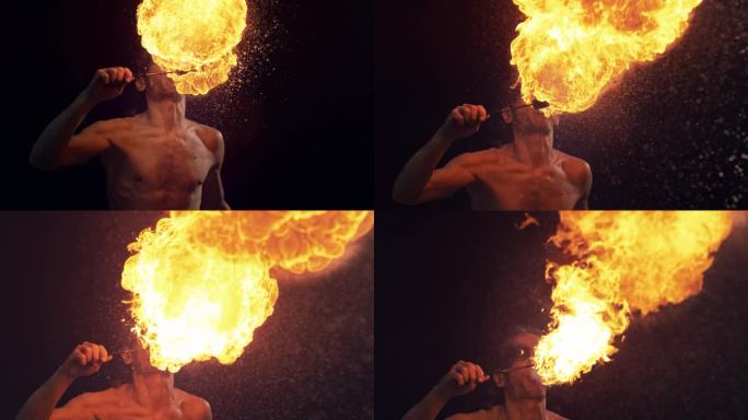喷火者在黑暗的舞台上表演。男表演者以惊人的视觉效果从嘴里喷出火焰。1000帧/秒的超级慢动作镜头