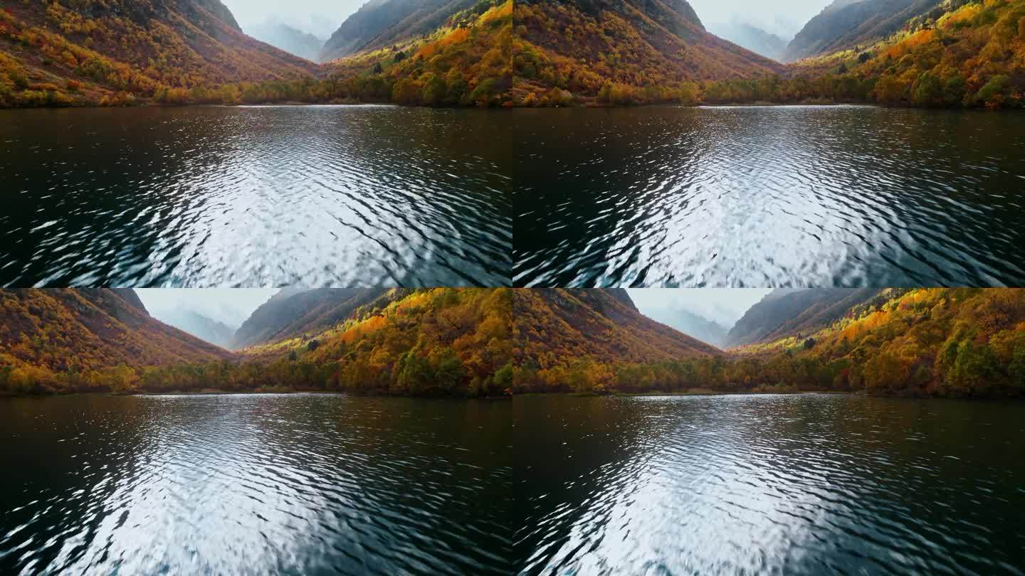 相机低飞水面上美丽的山湖，航拍与惊人的景观