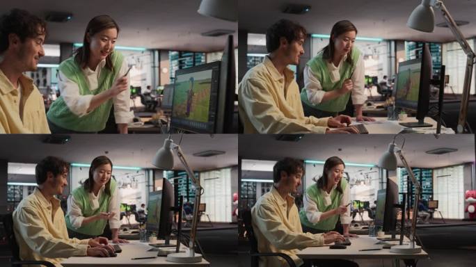 在游戏设计工作室办公室，白人男性游戏开发者使用带有3D建模软件的台式电脑与亚洲女性项目经理交谈。不同