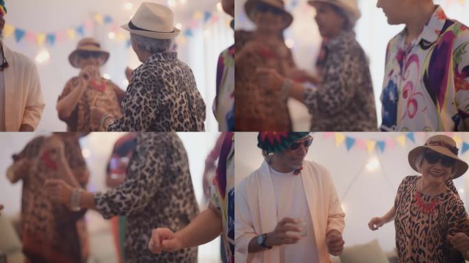 多种族老年人在欢乐时光喝酒跳舞的家庭聚会。