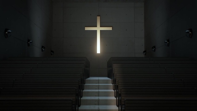 教堂的墙上挂着一个明亮的十字架。