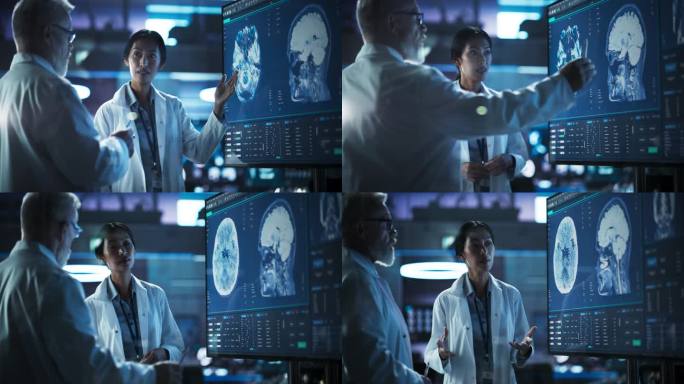 神经科学实验室会议:女性亚洲科学家和男性高加索外科医生讨论电视显示的核磁共振脑部扫描。研究脑损伤后康