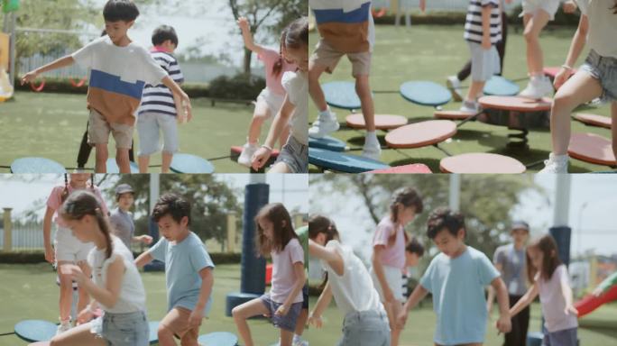 在一个阳光明媚的日子里，一群快乐的孩子在学校的绿色公园里玩平衡设备。