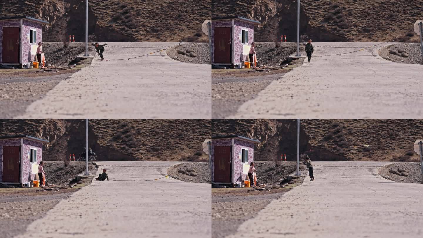 高原藏区玩耍跳绳的藏民小朋友小孩