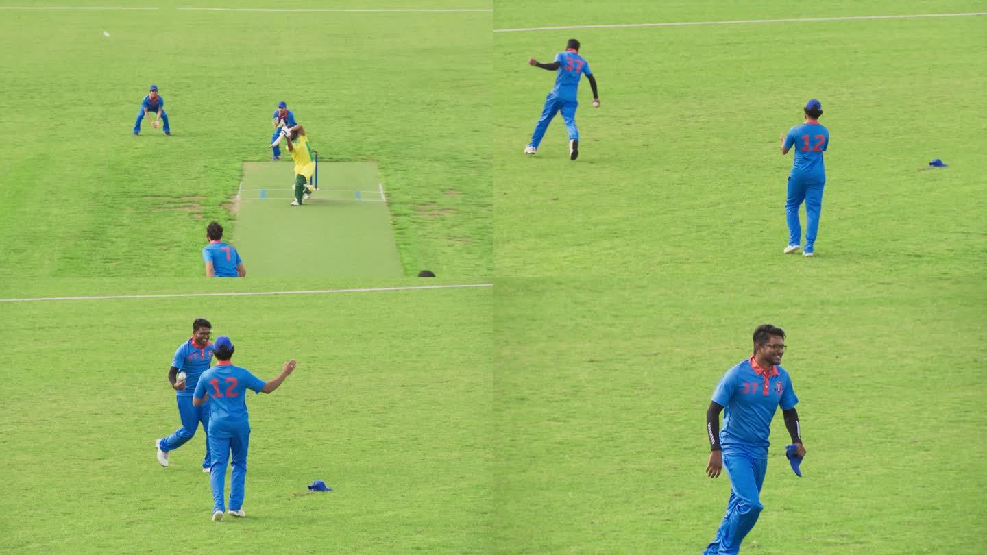 一场职业板球比赛的电视转播画面。印度击球手把球打到空中，对手队的守门员在球未触地的情况下接住球，防止