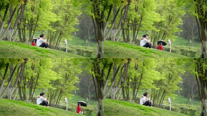 公园草地上坐着聊天的情侣