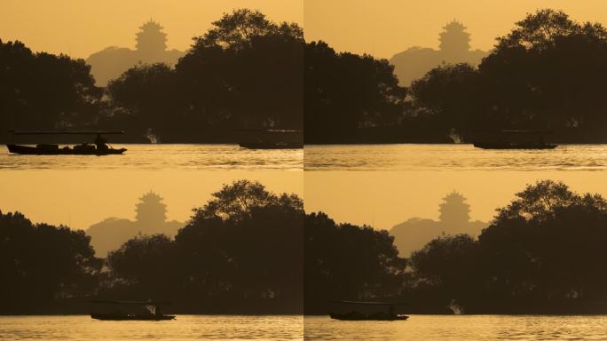 杭州西湖早晨的摇橹船手划船