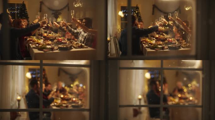 拉近镜头，透过窗户，老人和年轻的家庭成员举起并碰杯，在家里庆祝节日的圣诞之夜。亲戚们正在享用火鸡大餐