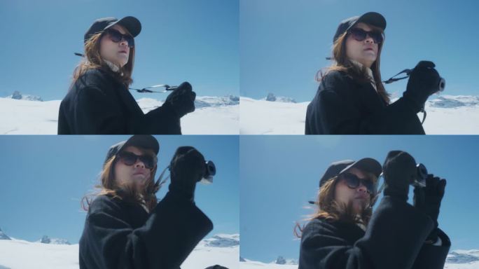 快乐的网红在瑞士的雪山上拍摄度假照片