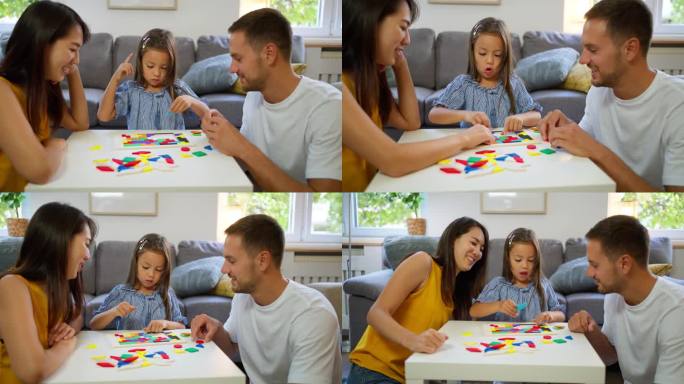 多种族家庭在家里玩拼图游戏