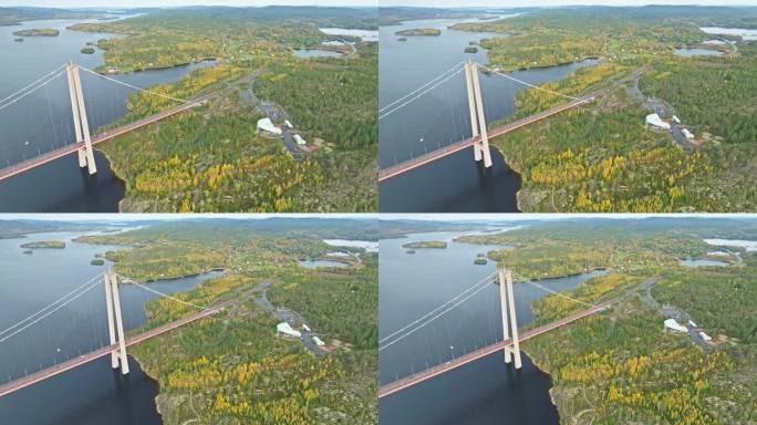 阴天的瑞典，雄伟的高海岸大桥横跨宁静的海洋。无人机航拍