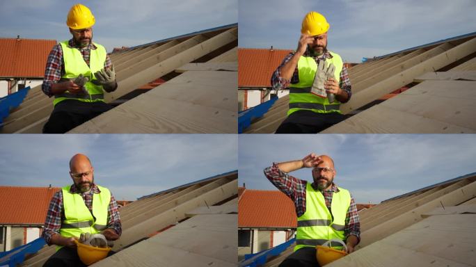 疲惫的白人男屋顶工人，在建筑工地的屋顶梁上休息