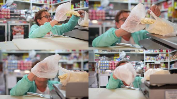 成熟的女店员在超市用磅秤称奶酪
