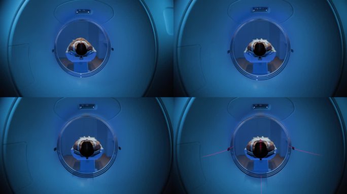 在拥有高科技设备的医学实验室中，躺在CT或MRI扫描床上的匿名女性患者在专业监护下接受扫描程序。床向