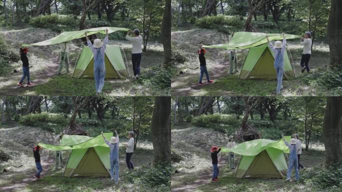 一个日本家庭在露营时搭帐篷