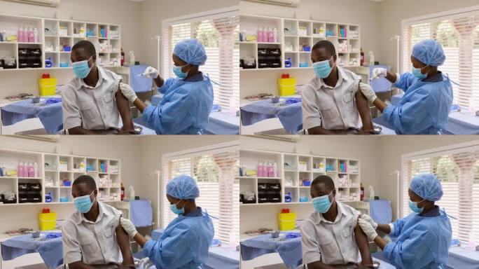 非洲黑人女护士在医生的房间里给非洲黑人男病人注射
