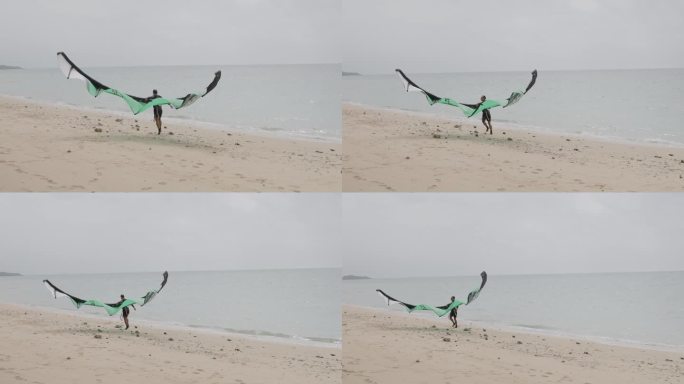 风筝冲浪者带着他的风筝去海边