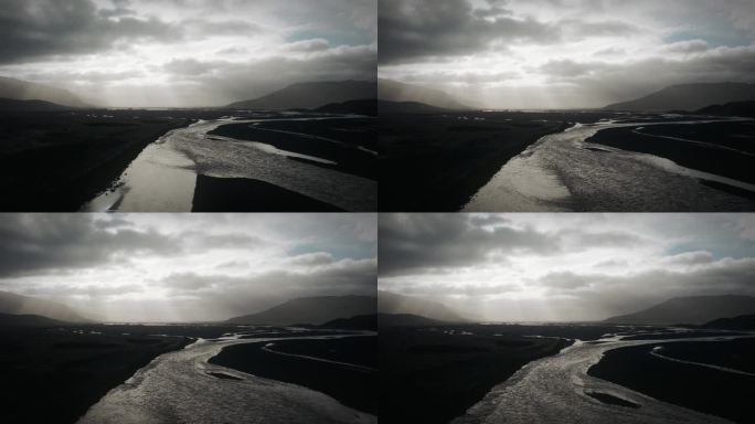 空中托尔山谷，飞越冰川河流流经黑色火山泛滥平原，thorsmörk戏剧性的喜怒无常的景观冰岛
