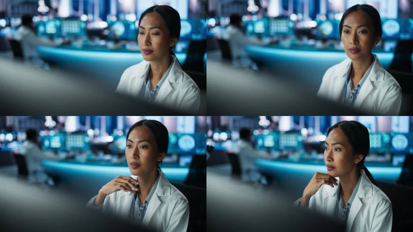 现代医院医学研究实验室中亚洲女医生使用台式电脑的画像专业医师核对患者检查结果、药物处方、症状史