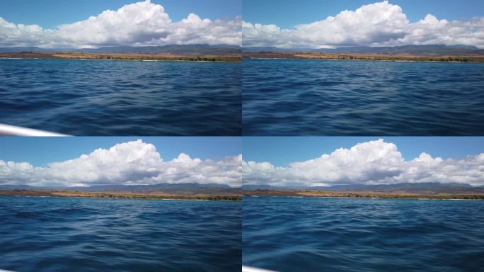 从夏威夷考艾岛海岸外的一艘移动的快艇上拍摄的威美亚峡谷的万向节广角镜头。4 k