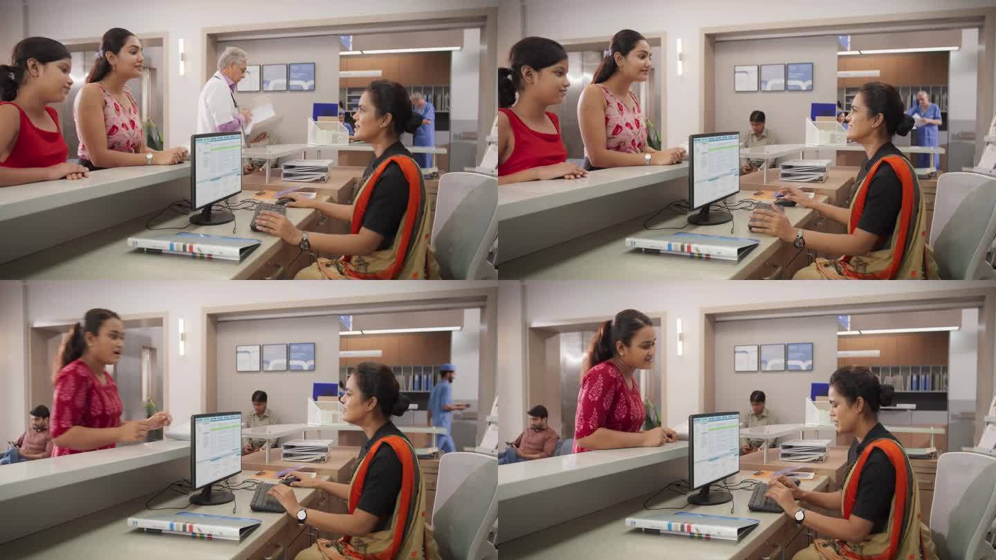 在一家现代化的当地医院里，印度接待员在绿屏电脑上工作并与病人交谈的肖像。女性卫生保健工作者制定就诊时