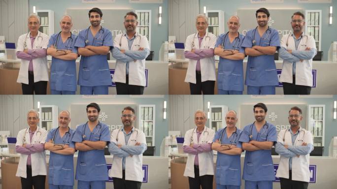 一群印度男医生在医院里微笑着看着镜头的肖像。医疗专业人员、护士和专家在诊所摆姿势。拯救生命的日常英雄