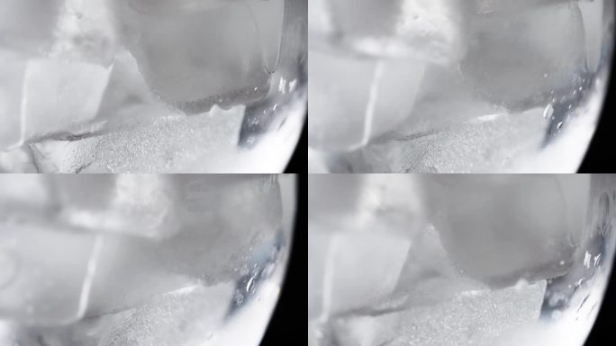 动态运动中的冰块:旋转的冰块令人着迷的特写镜头。