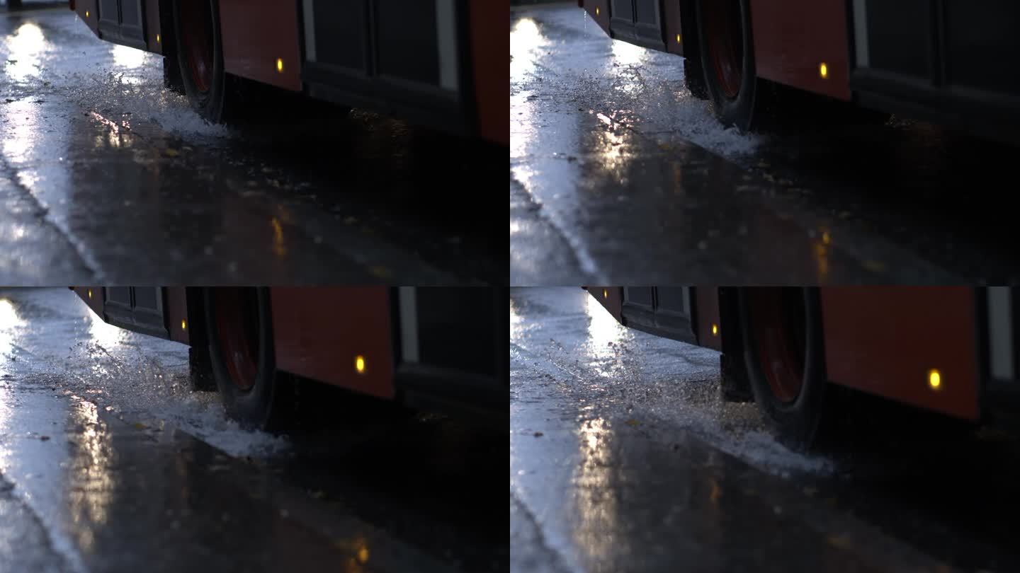 高速摄像机以800帧/秒的超慢动作捕捉到大白天公交车在人行道上溅水，车轮在沥青上