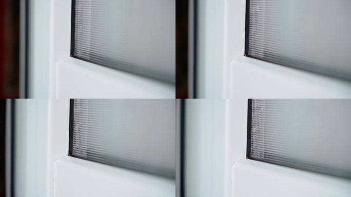 白色塑料门与不透明的纹理玻璃，流畅的相机运动