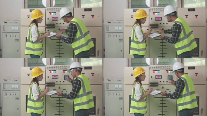 在工业工厂检查开关柜配电变电站状态的工程师和技术工人。电气工程师。